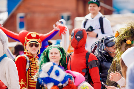 Sheregesh, Kemerovo, Russia - April 7, 2018: Grelka Fest: Group of people ski and snowboard riders in carnival costumes.のeditorial素材