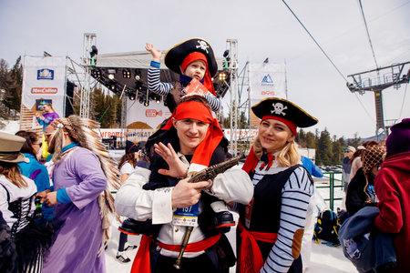 Sheregesh, Kemerovo, Russia - April 7, 2018: Grelka Fest: Group of people ski and snowboard riders...
