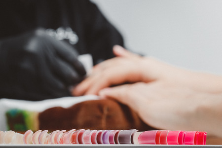 Manicure set colorful artificial nails in beauty shopの写真素材