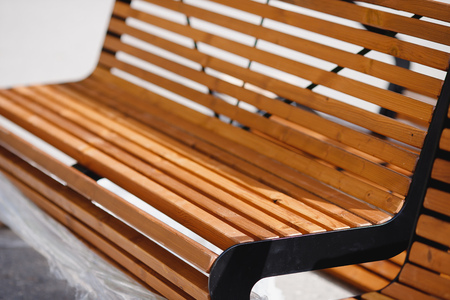 Modern wooden benches for relaxing in park, close-upの写真素材
