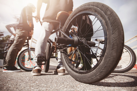 Guy is riding bmx bike. Concept extreme teenagers. Sunsetの写真素材