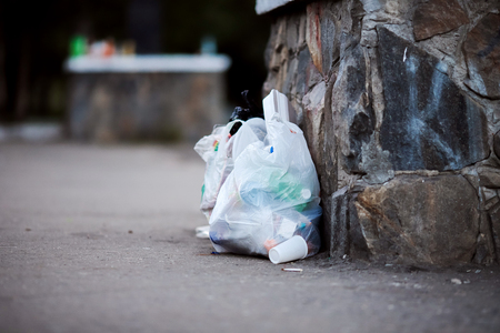 Close-up of debris in bags, bottles, cans from under alcohol after events and concerts.の写真素材