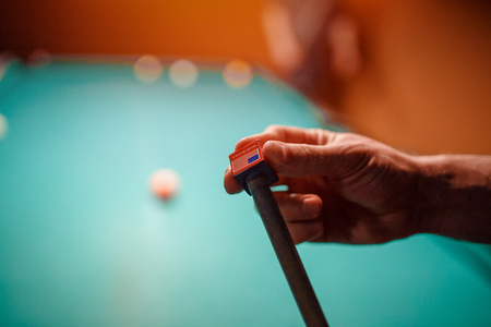 Balls for billiards snooker are triangle, man smashes cueの写真素材