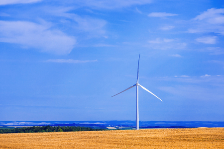 Wind turbines generating electricity. Concept alternative energy. Blue skyの写真素材