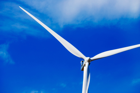 Wind turbines generating electricity. Concept alternative energy. Blue skyの写真素材