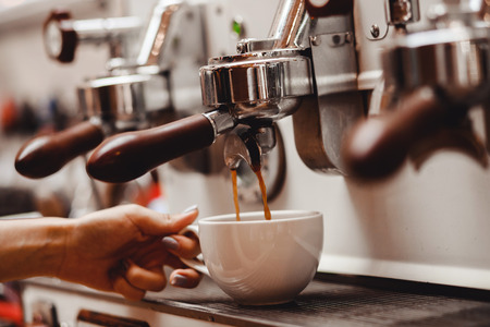 Close-up prepares espresso in coffee shop baristaの写真素材