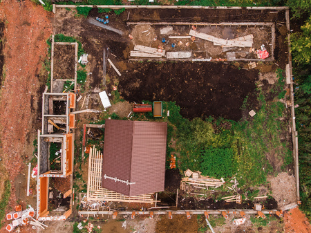 Construction work building house made of wood, tiled roof. aerial view dronの写真素材