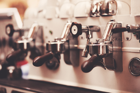 Coffee extraction espresso from professional machine and barista with filterの写真素材