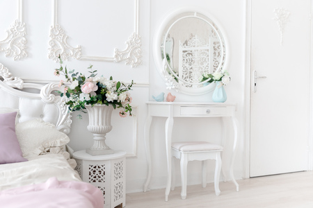 Boudoir table. Details of interior bedroom for girls and make-up, hairstyles with mirrorの写真素材