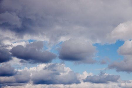 Rain clouds against the blue sky. Concept weather forecastの写真素材