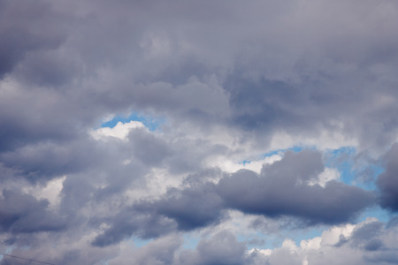 Rain clouds against the blue sky. Concept weather forecastの写真素材