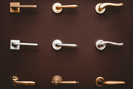 Set brown wooden door with metal handle modernの写真素材