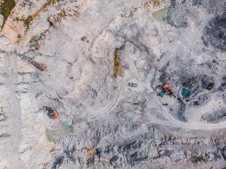 Aerial view drone Open pit mine, digging for gold, minerals, iron ore, marble extractive industryの写真素材