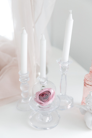 Modern antique candlestick with wax candles in classic style, white colorの写真素材