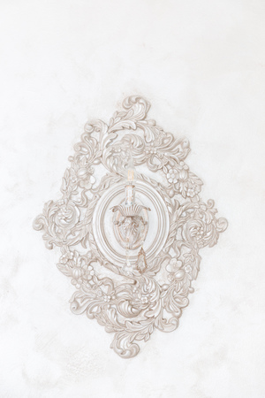 Decoration lighting lamp with molding item white plaster. Relief stucco interiorの写真素材
