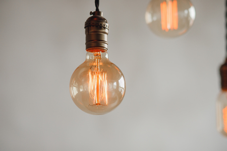 Set edison retro lamp on loft gray concrete background. Concept ideaの写真素材