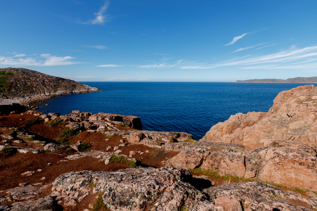 View of mountain lake and open ocean in tundra, Teriberka.の写真素材
