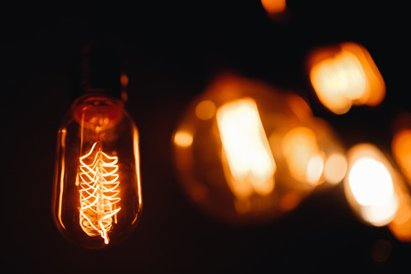Set edison retro lamp on loft gray concrete black background.の写真素材