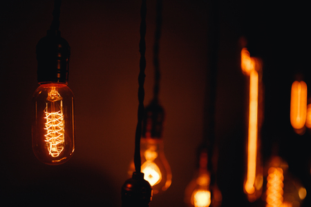 Set edison retro lamp on loft gray concrete black background.の写真素材