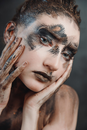 Halloween make up. Portrait pale gothic daemon woman.の写真素材