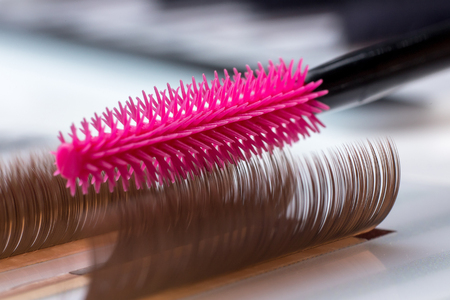 Eyelash brown extension procedure. Set Lashes close up pink combの写真素材