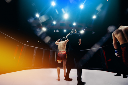 Victory boxer battles without MMA boxing rules. hign contrast and monochrome color tone. Toning. Sport advertising.の写真素材