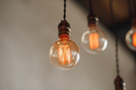 Set edison retro lamp on loft gray concrete background.の写真素材