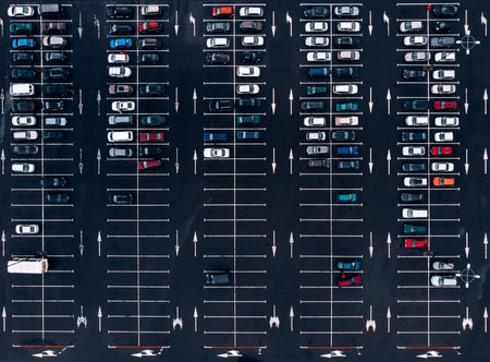 Aerial view parking place car lot near mall, top view