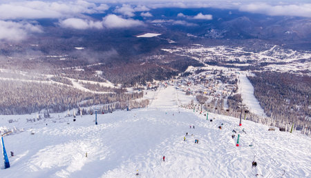 Sheregesh, Kemerovo, Russia, Aerial view drone mountains and forest, winter ski resortの写真素材