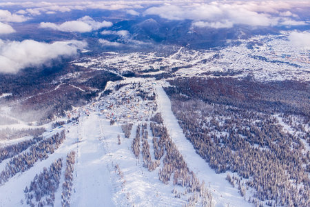 Sheregesh, Kemerovo, Russia, Aerial view drone mountains and forest, winter ski resortの写真素材