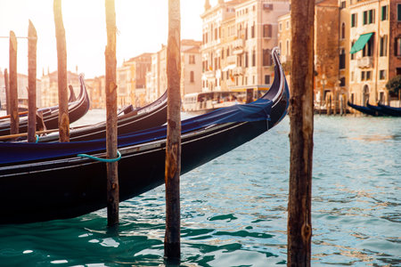 Canal with gondolas in Venice, Italy. Sunny day. Concept of romantic travel.の写真素材