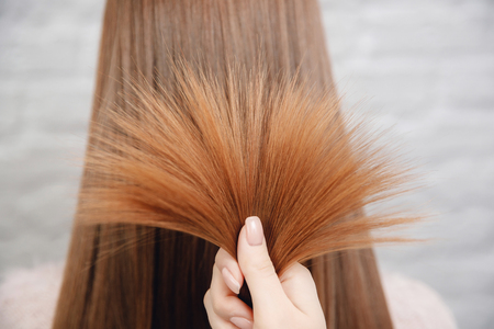Sick, cut and healthy hair care straightening. Before and after treatment.の写真素材