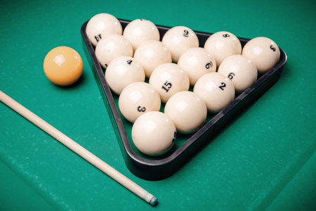 Billiard Russian green wood table and cue with white balls.
