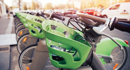 Number of bicycles are on parking for rent by tourists contactless payment.