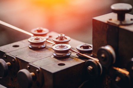 Production of copper wire, bronze cable in reels at factory.の写真素材