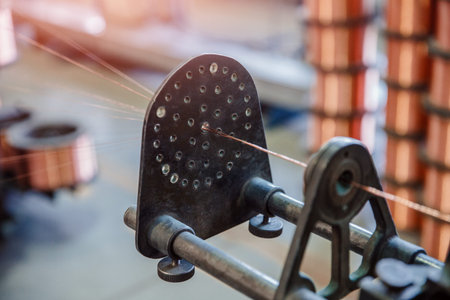 Production of copper wire, bronze cable in reels at factory.の写真素材