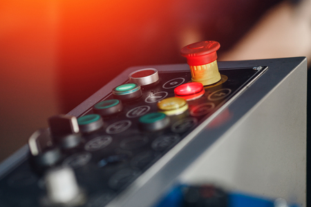 Control buttons in industrial production, blurred background. Heavy industry metallurgy concept.の写真素材