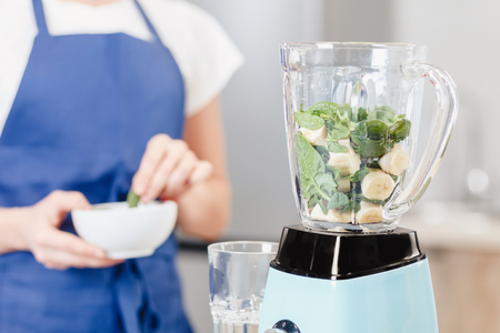 Blender healthy vegetarian smoothie made from fresh fruits and vegetables. Concept detox food.の写真素材