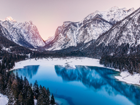 Misurina lake sunset blue winter Dolomites Val di Funes valley, Italy. Aerial top viewの写真素材