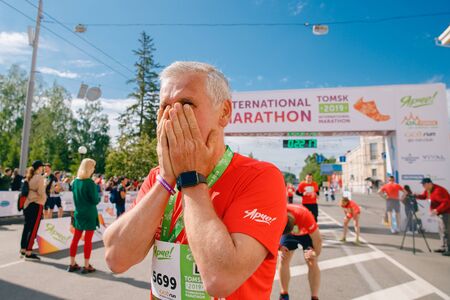 Tomsk, Russia - June 9, 2019: International Marathon Jarche athletes runners crowd are at finishのeditorial素材