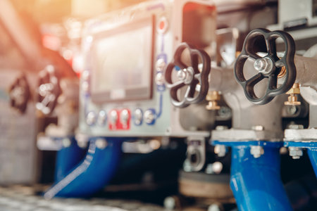 Valve for regulating pressure of oil and water, in background screen panelの写真素材