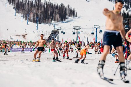 Sheregesh, Kemerovo region, Russia - April 13, 2019: Grelka Fest ski and snowboard riders in bikiniのeditorial素材