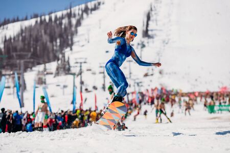Sheregesh, Kemerovo region, Russia - April 13, 2019: Grelka Fest ski and snowboard riders in bikiniのeditorial素材