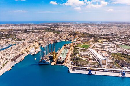 Valletta capital city of Malta. Panorama port and blue sea. Aerial top viewの写真素材
