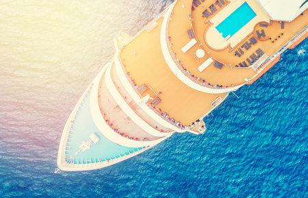 Cruise ship in blue sea. Aerial view photo