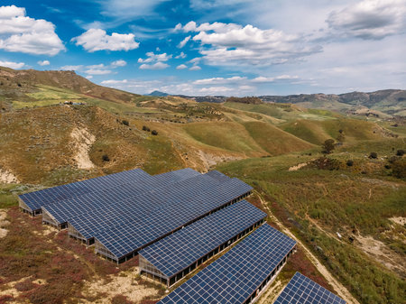 Farm of solar panels for production of alternative eco electricity. Aerial top view.