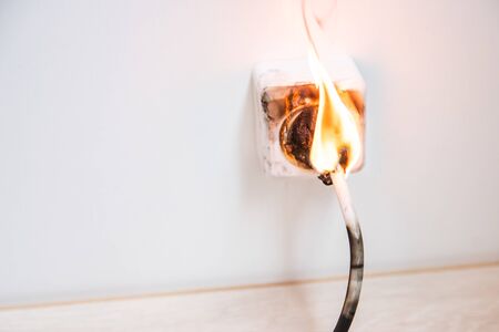 Electrical short circuit. Wiring cable burn on fire flameの写真素材