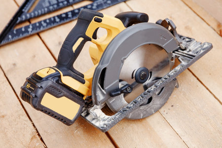 Portable tool circular saw for cutting wood.