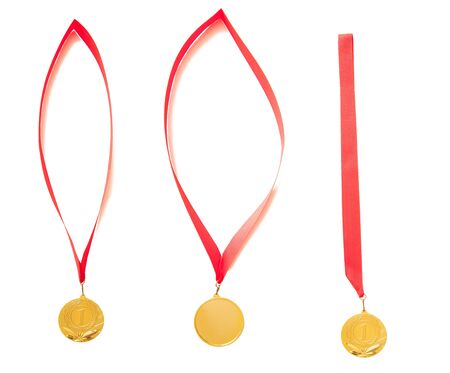 Medal first place with red ribbon, white isolated backgroundの写真素材