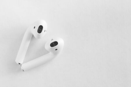 White headphones wireless earphones, copy space backgroundの写真素材